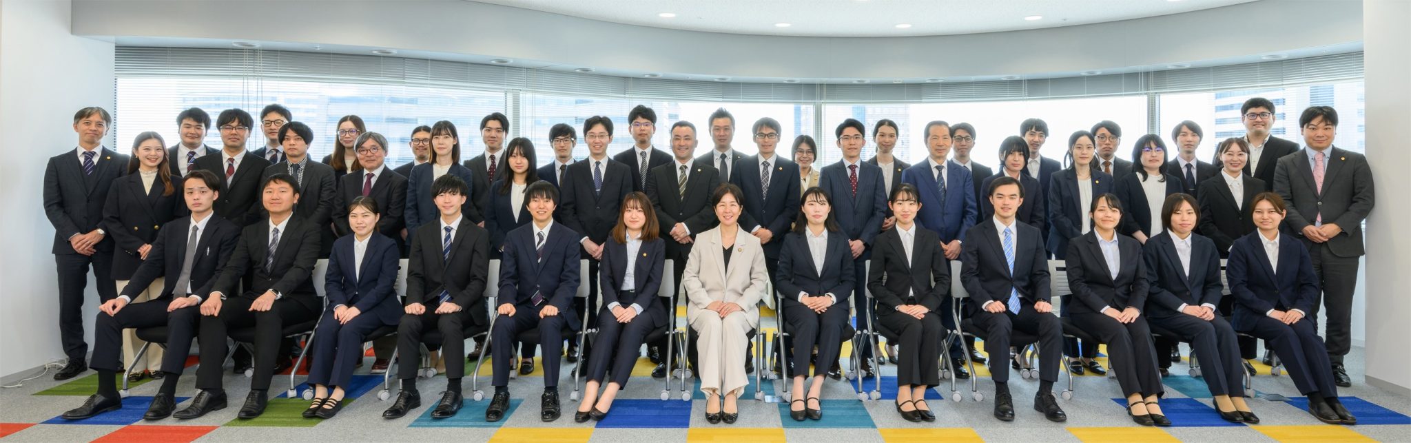 Group photo of staff at Minatomirai Patent Firm